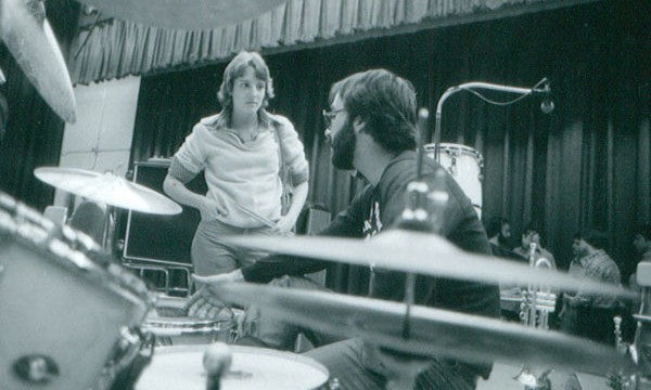 Drummer Peter Erskine talking with one of the drum students.